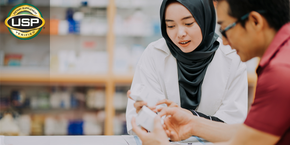 woman and man discusing dietary supplement product in store